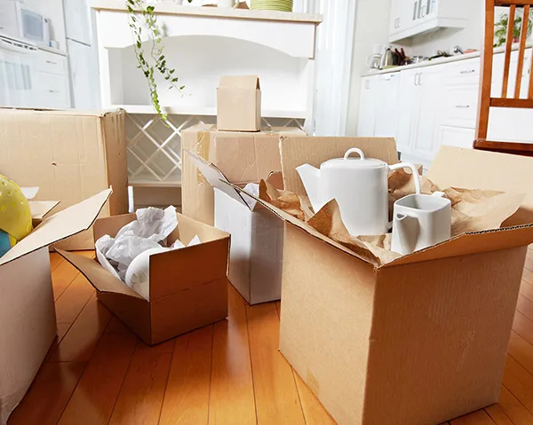 A room with packed boxes, showing storage services.