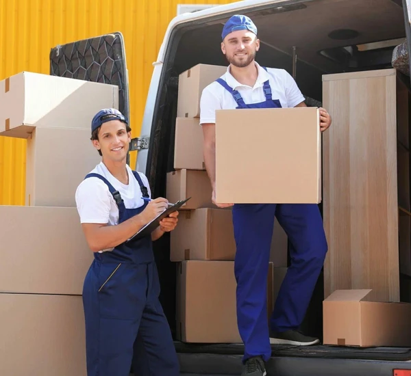 Movers unloading boxes, representing efficient and reliable unloading services for various needs.